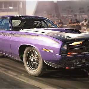 Old Hemi Cuda Beats up on NEW Muscle!