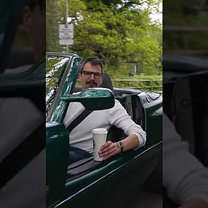 The many uses of the BMW Z1’s sliding doors. ⬇️⬆️ #CarThrottle #BMW #shorts